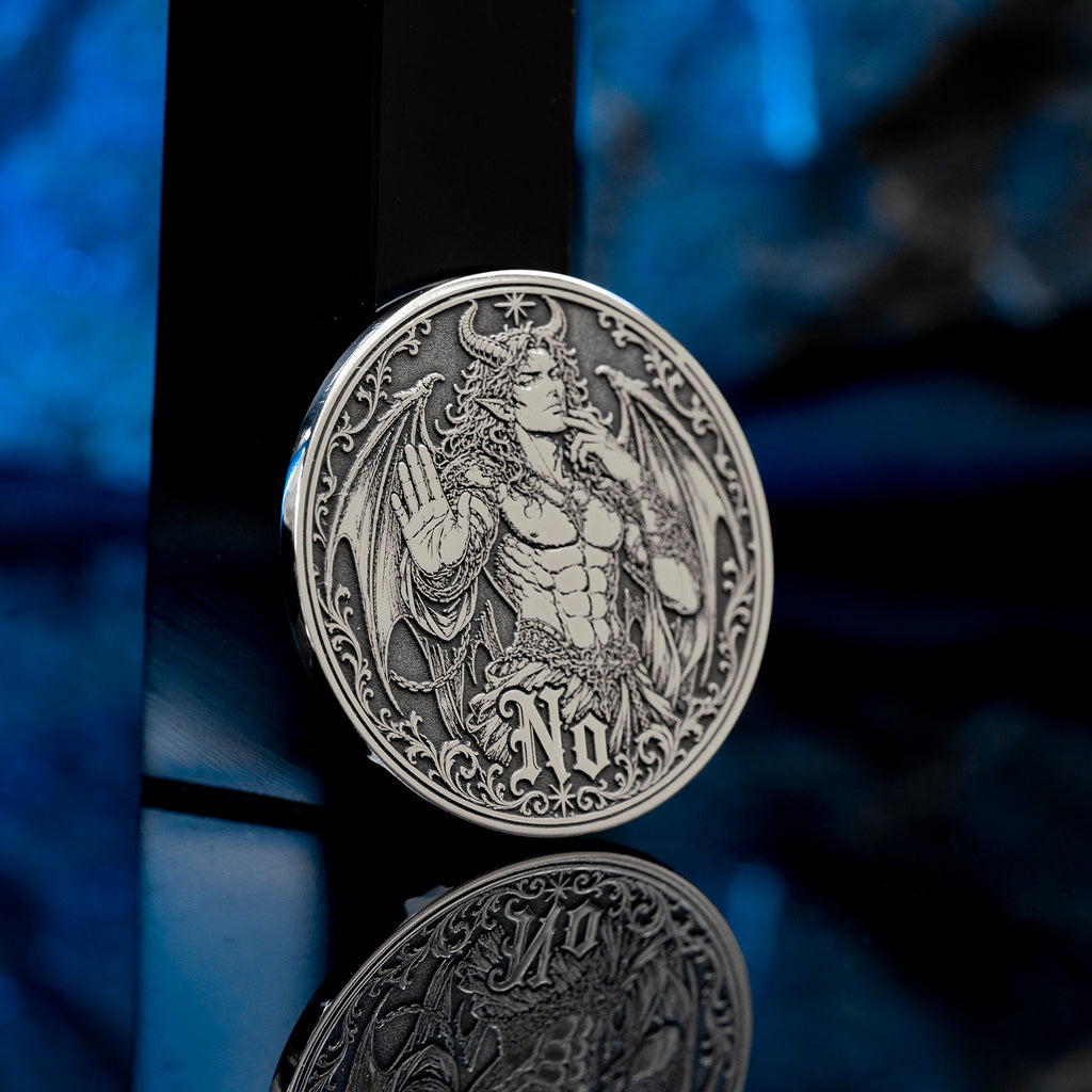 Double-sided angel demon decision coin with Yes and No sides for oracle-style choices