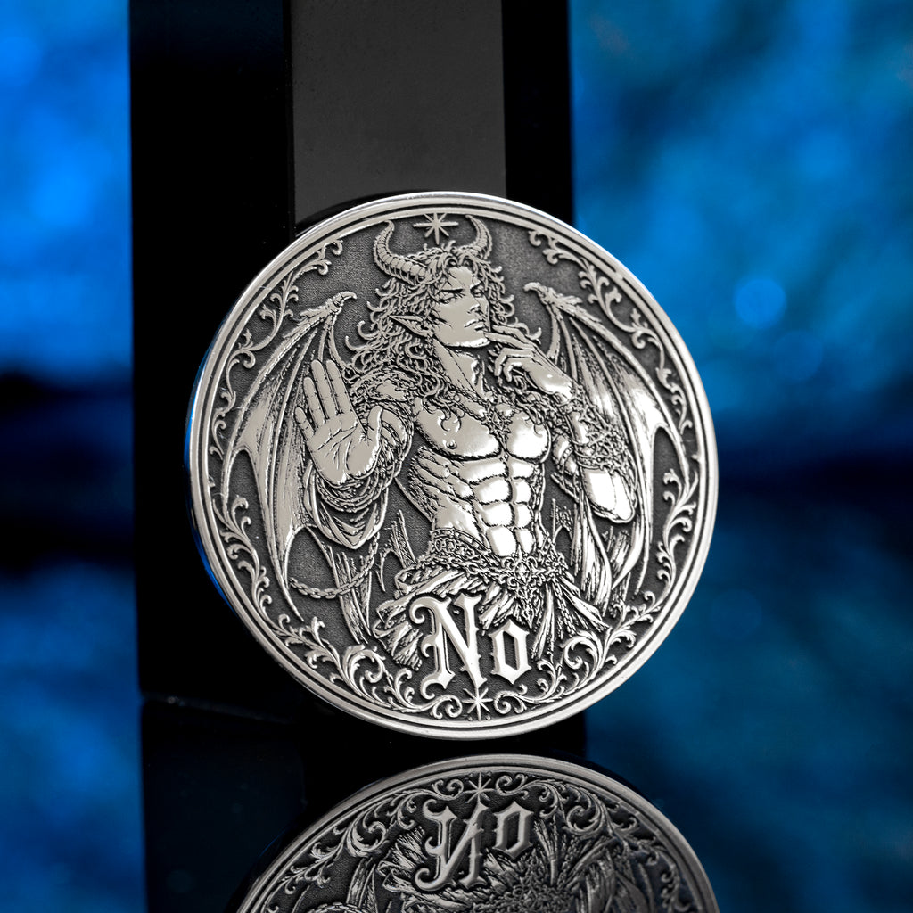 Double-sided angel demon decision coin with Yes and No sides for oracle-style choices