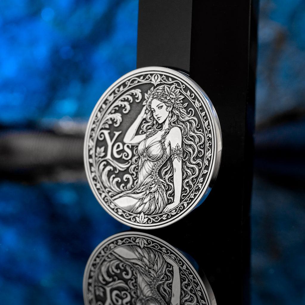Double-sided fantasy decision coin with a nymph on the Yes side and an imp on the No side