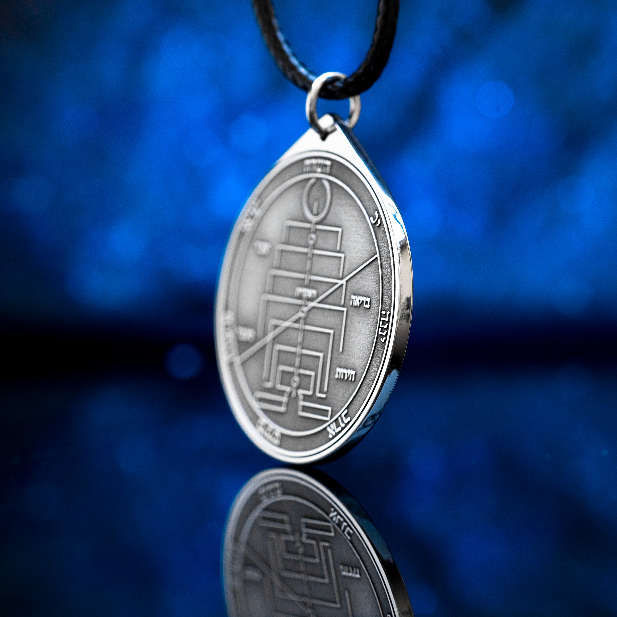Engraved Fifth Pentacle of Uranus pendant, a planetary talisman for new beginnings, reinvention, freedom, renewal, and creating a new future after profound change