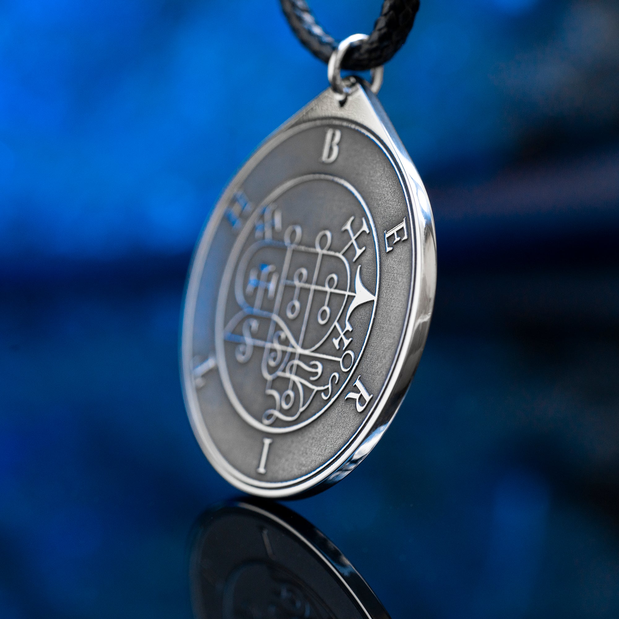 Berith seal pendant with engraved Ars Goetia sigil associated with alchemy, gold, dignities, and true answers