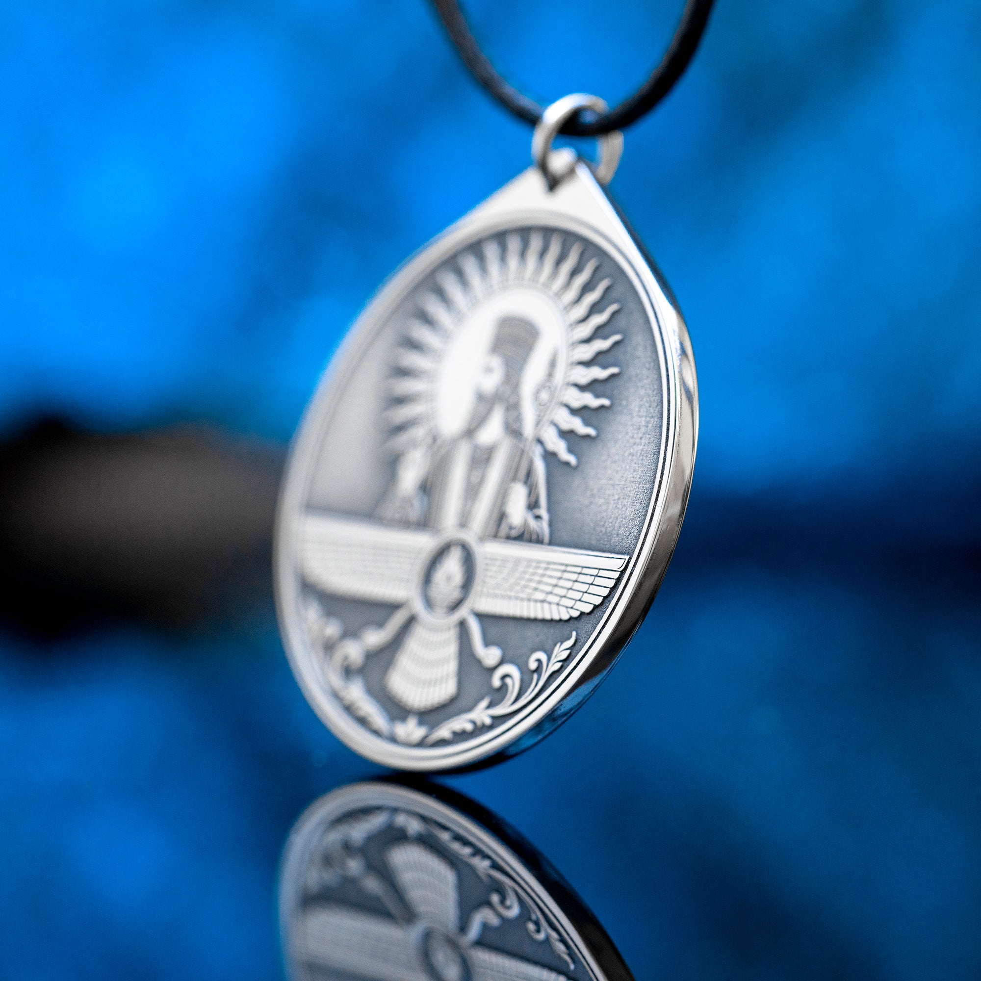 Ahura Mazda pendant with Faravahar style wings, sacred fire and ancient Persian Zoroastrian symbolism