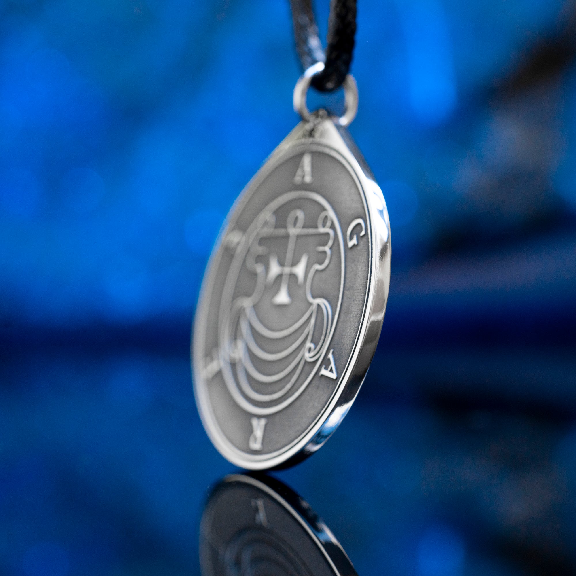 Double-sided Agares pendant with Ars Goetia seal on one side and Agares portrait on the other