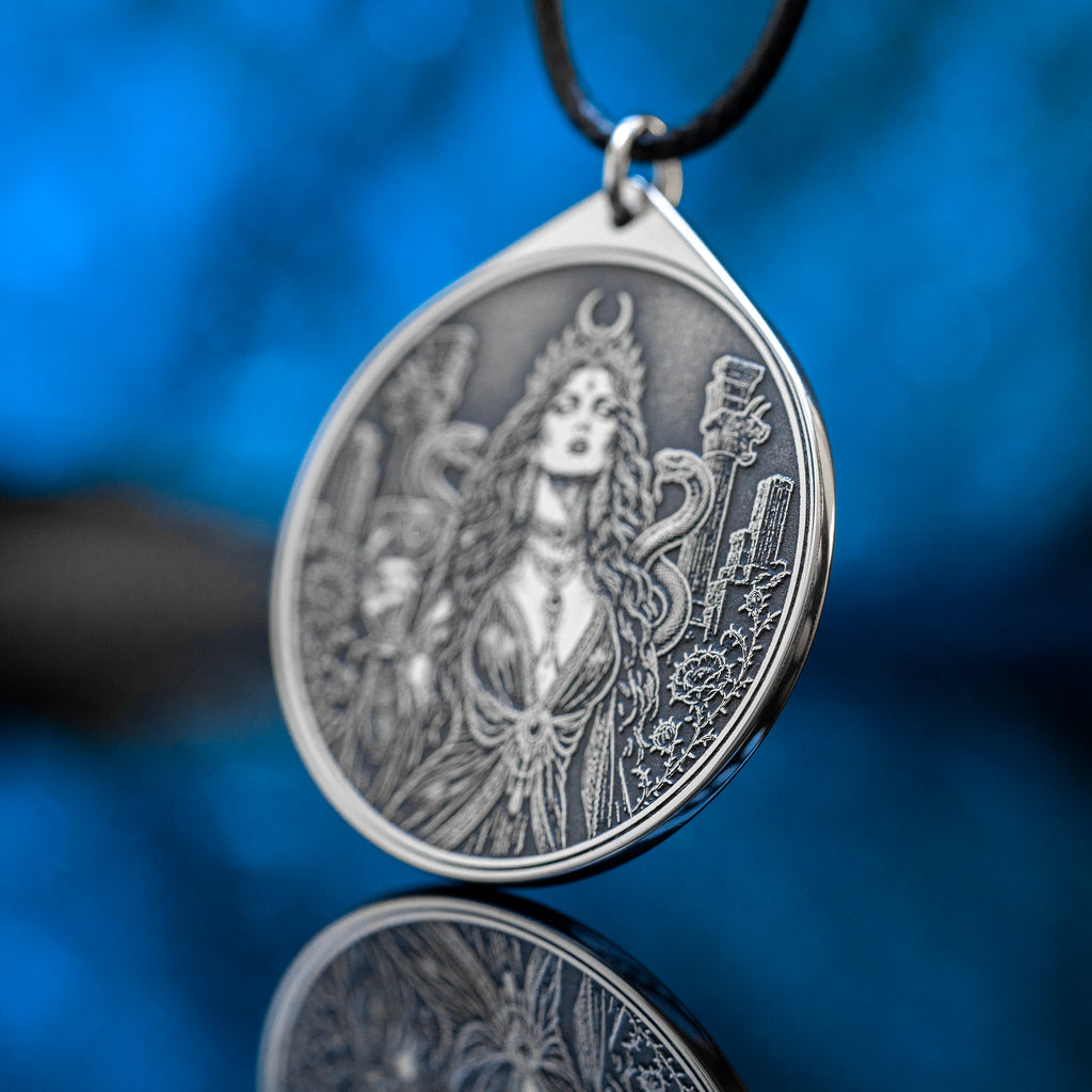 Az Jahi pendant with serpents, ritual chalice and crescent crown in black and white occult engraving style