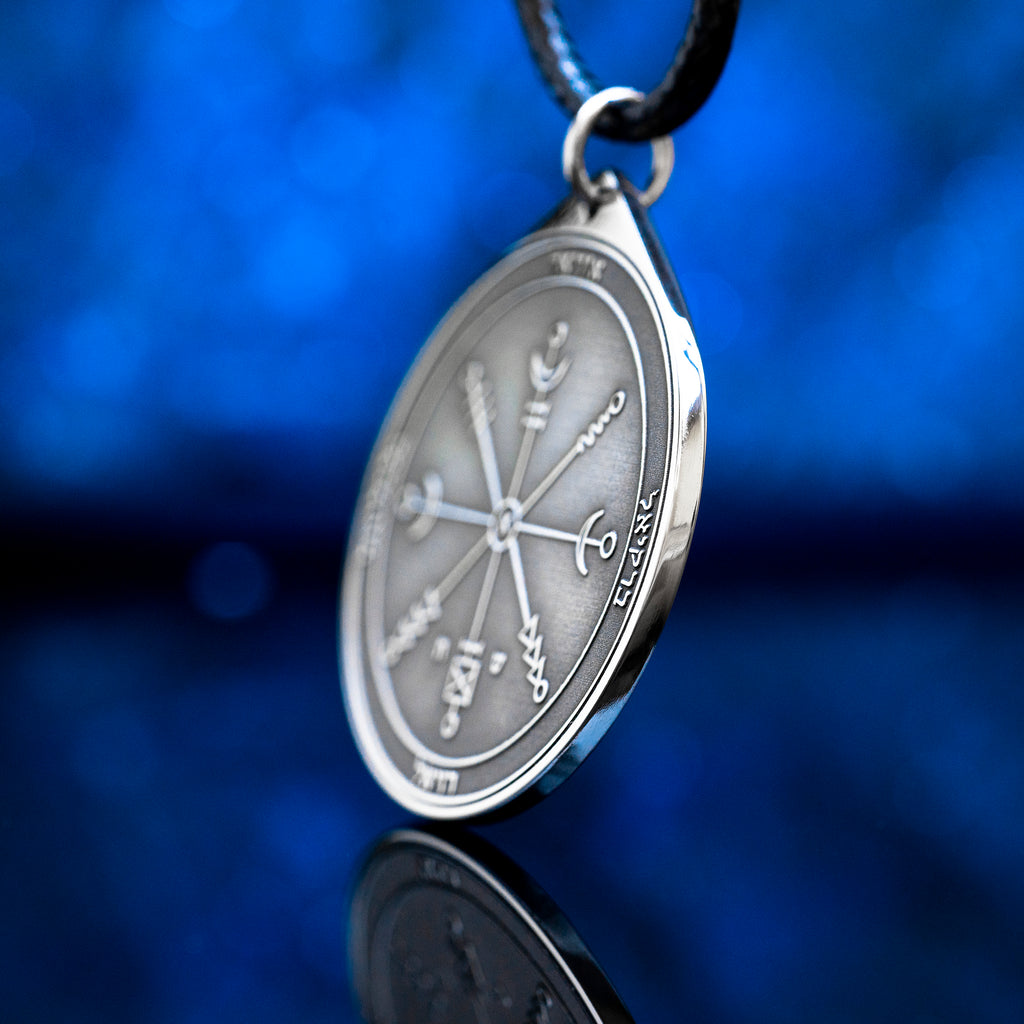 Engraved First Pentacle of Uranus pendant, an original planetary talisman symbolizing awakening, independence, sudden insight, innovation, and freedom from mental stagnation