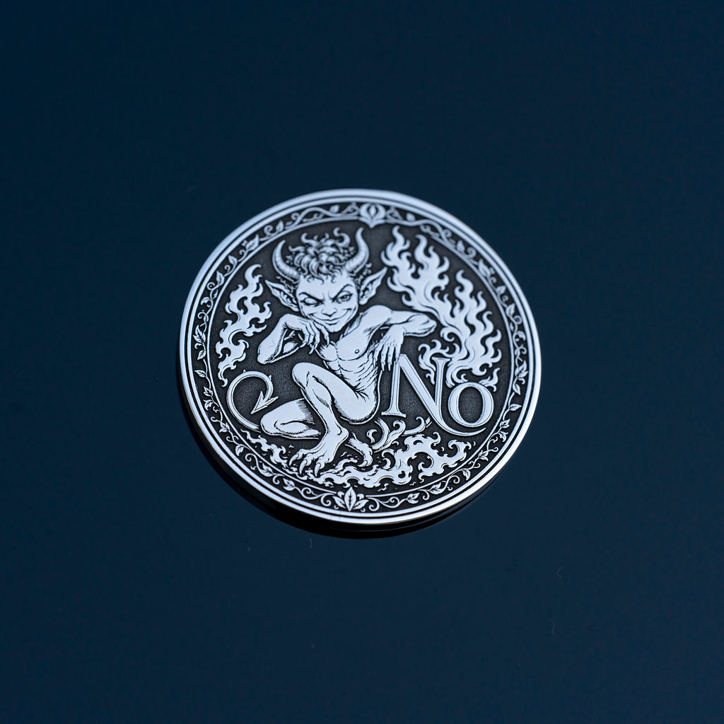 Double-sided fantasy decision coin with a nymph on the Yes side and an imp on the No side