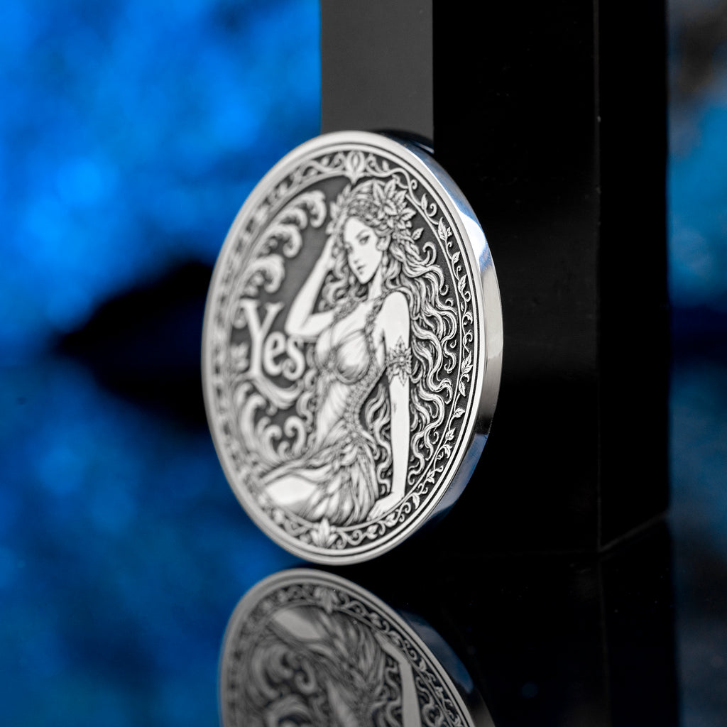 Double-sided fantasy decision coin with a nymph on the Yes side and an imp on the No side