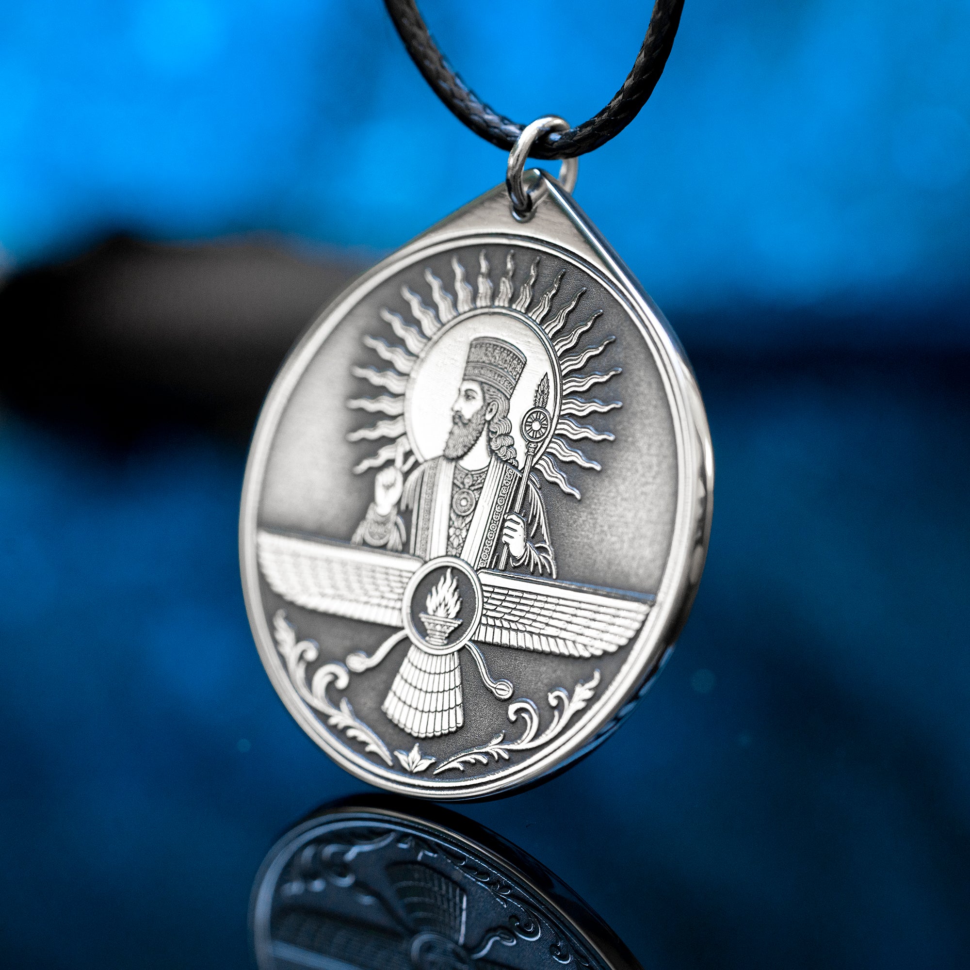 Ahura Mazda pendant with Faravahar style wings, sacred fire and ancient Persian Zoroastrian symbolism