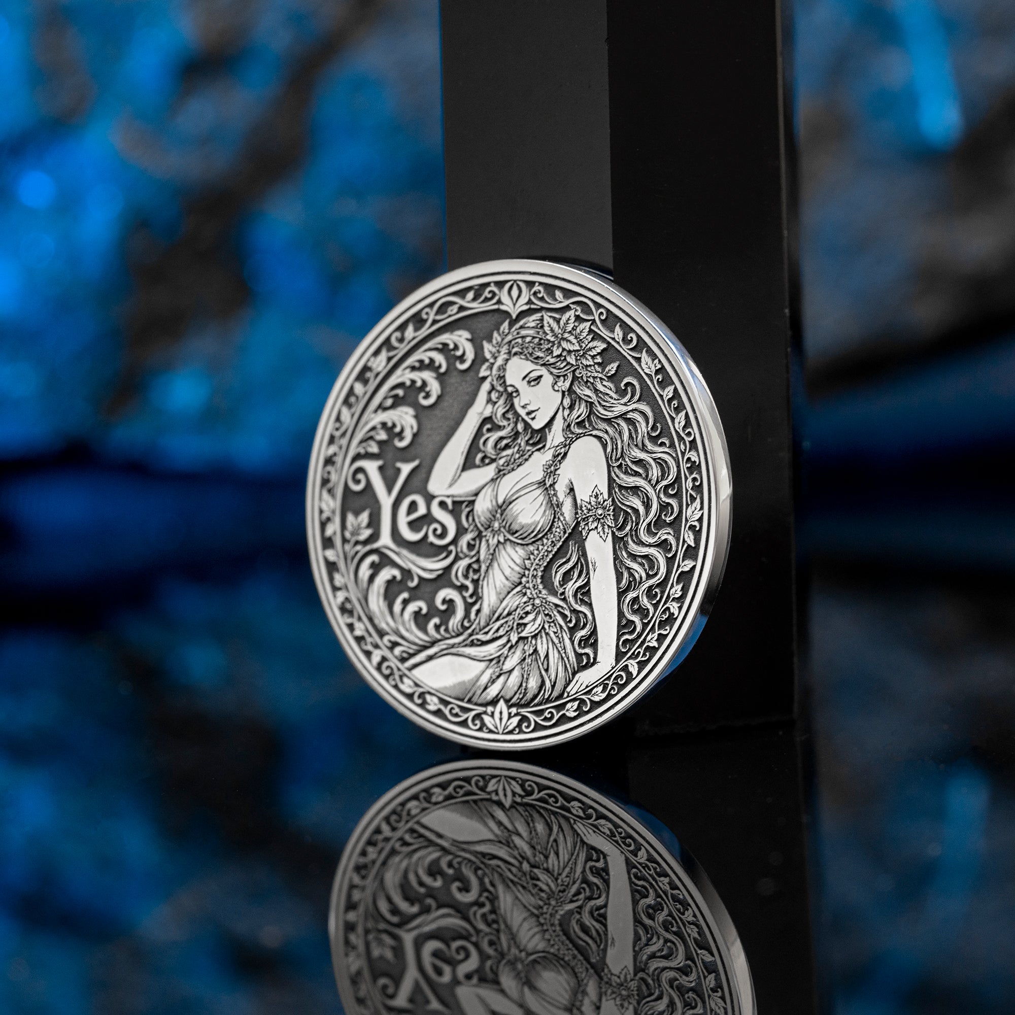 Double-sided fantasy decision coin with a nymph on the Yes side and an imp on the No side