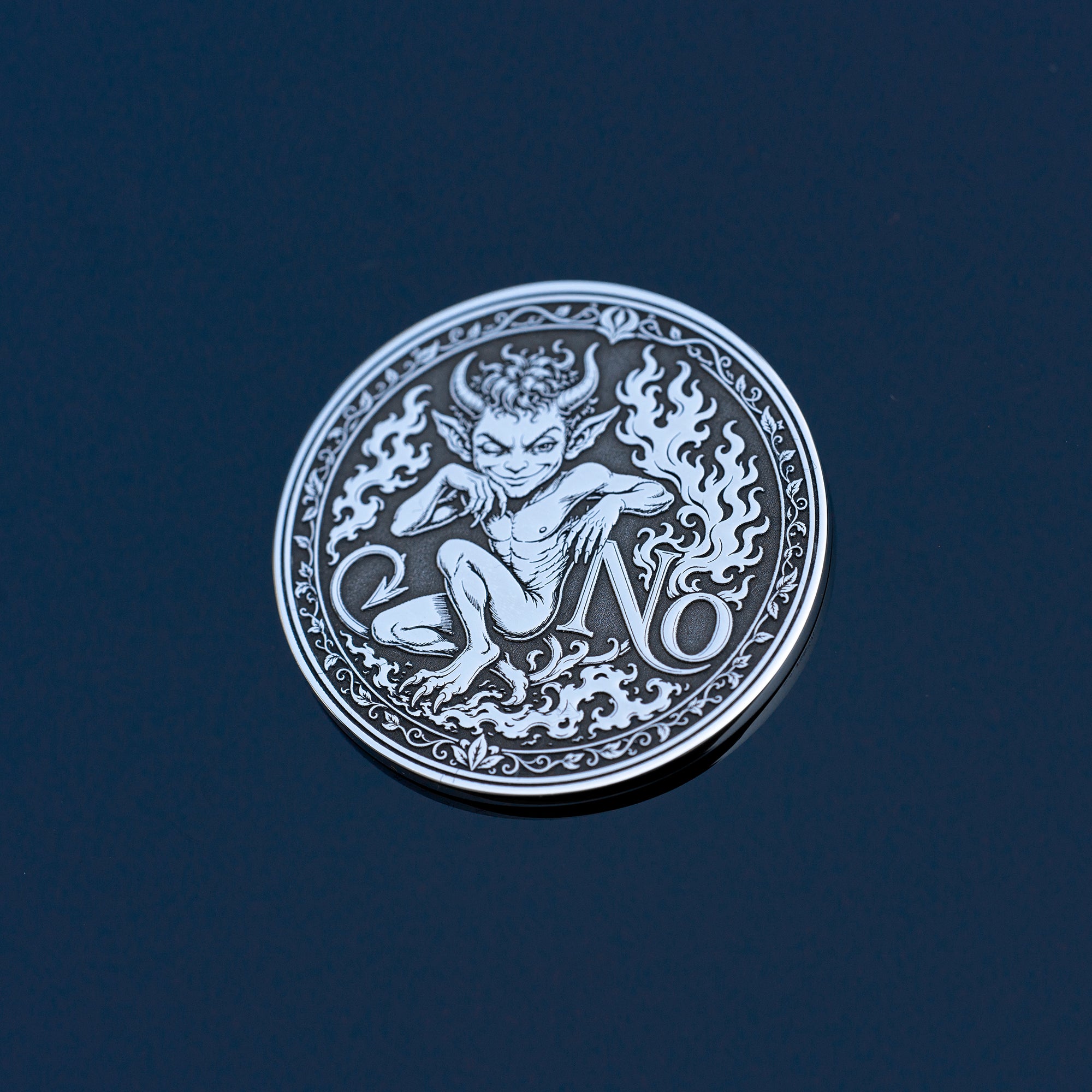 Double-sided fantasy decision coin with a nymph on the Yes side and an imp on the No side