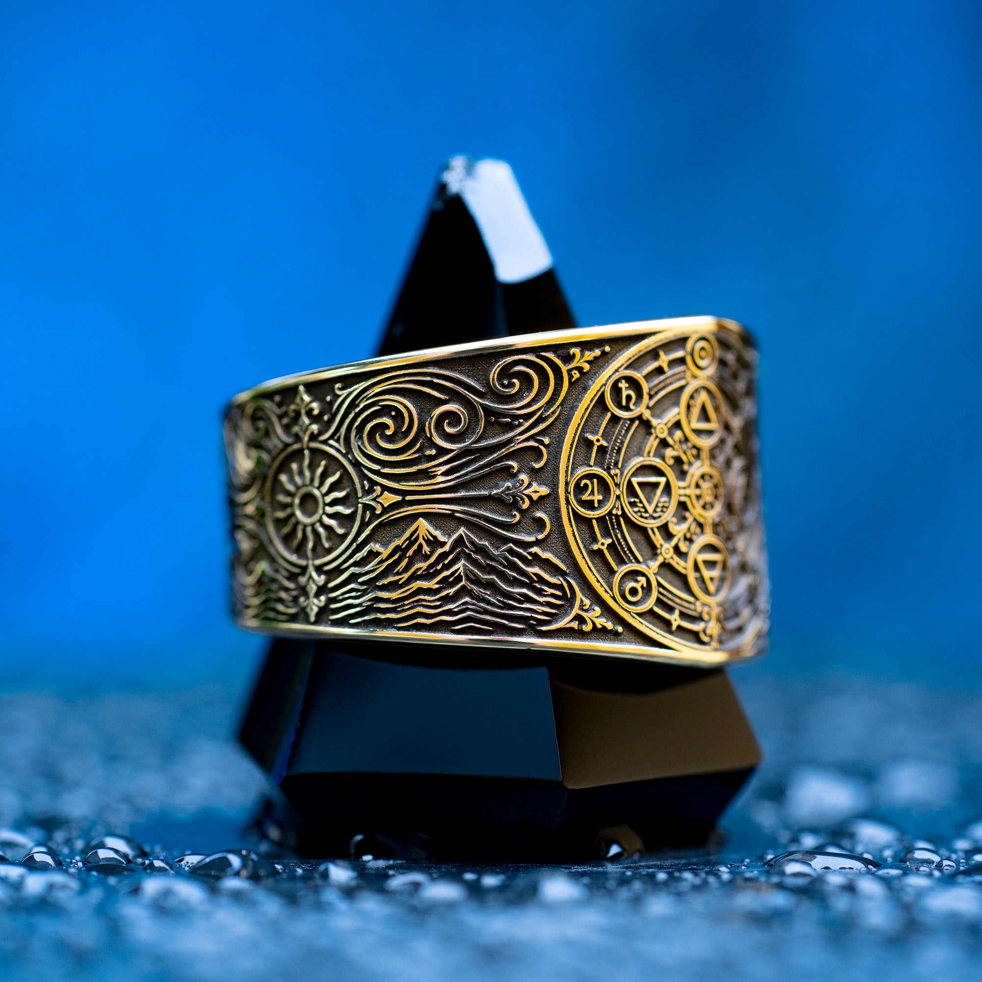 Gothic alchemical ring with Fire, Water, Air, Earth, seven planetary metal symbols, and detailed occult engraving
