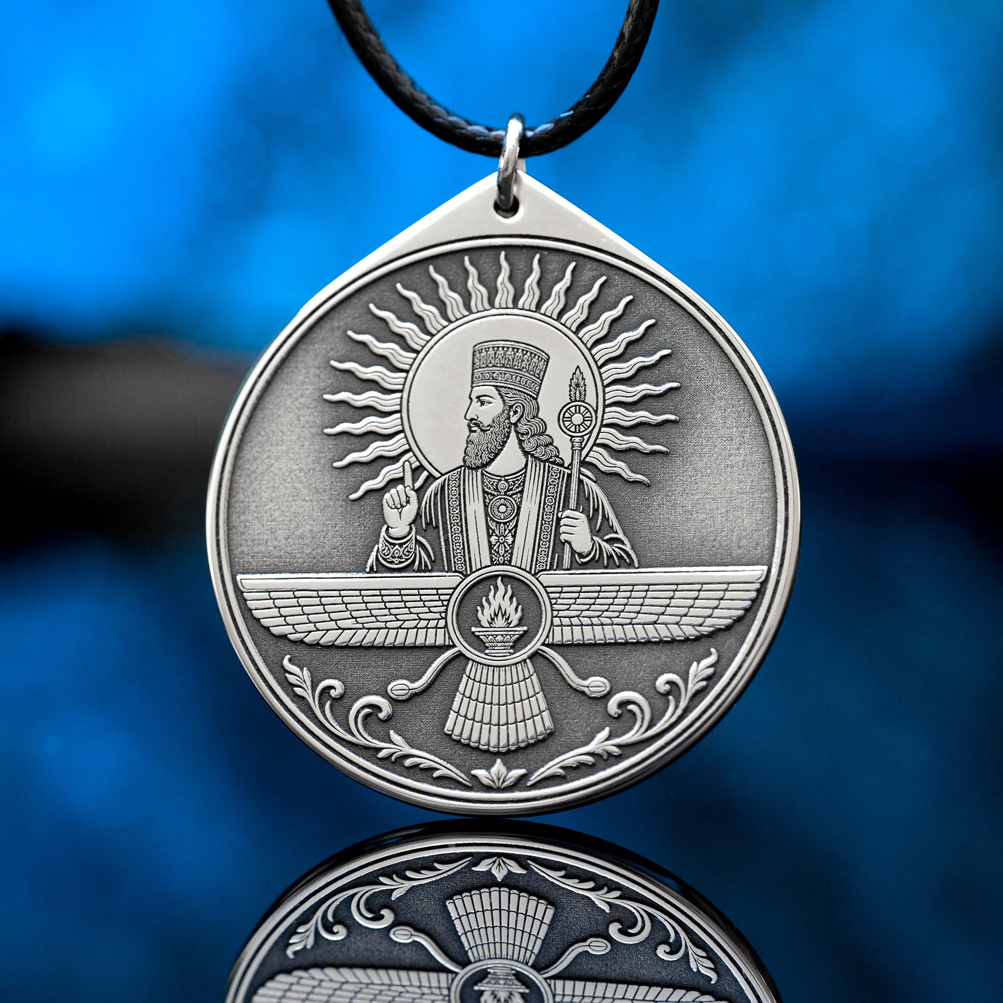 Ahura Mazda pendant with Faravahar style wings, sacred fire and ancient Persian Zoroastrian symbolism