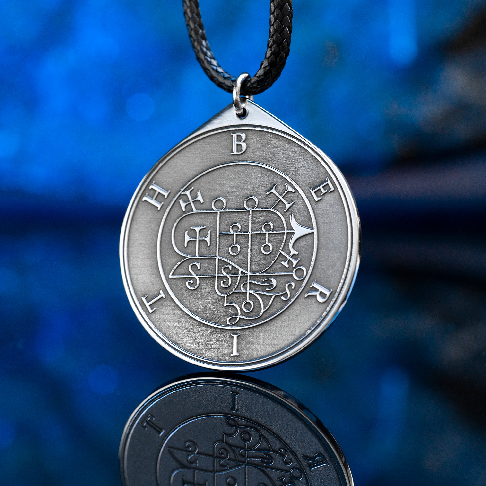 Berith seal pendant with engraved Ars Goetia sigil associated with alchemy, gold, dignities, and true answers