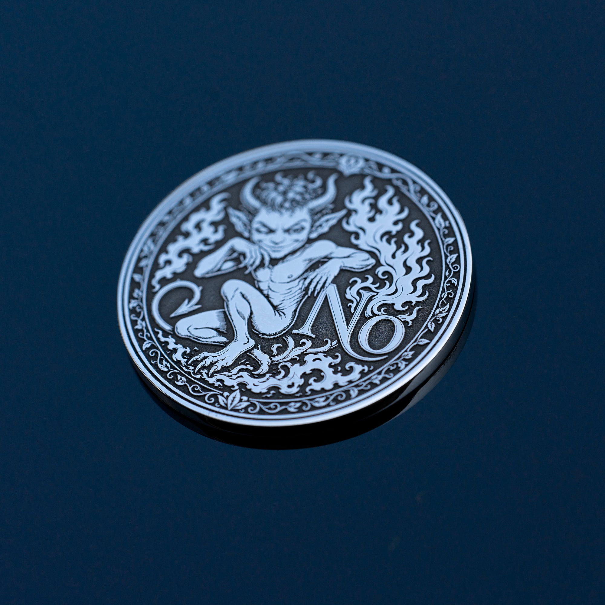 Double-sided fantasy decision coin with a nymph on the Yes side and an imp on the No side