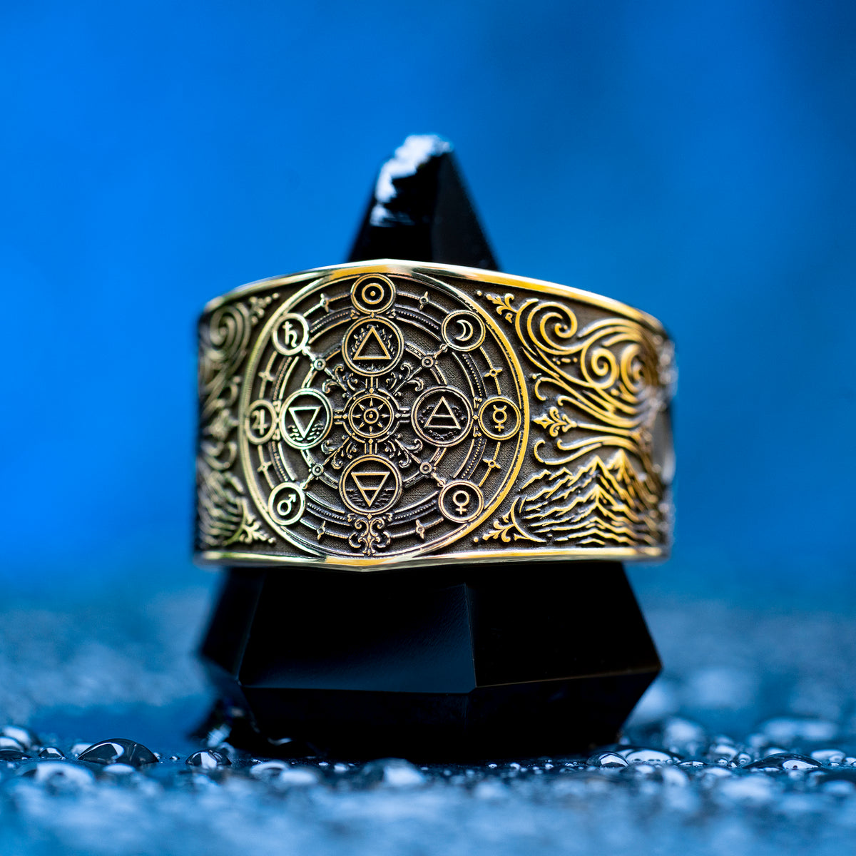 Gothic alchemical ring with Fire, Water, Air, Earth, seven planetary metal symbols, and detailed occult engraving