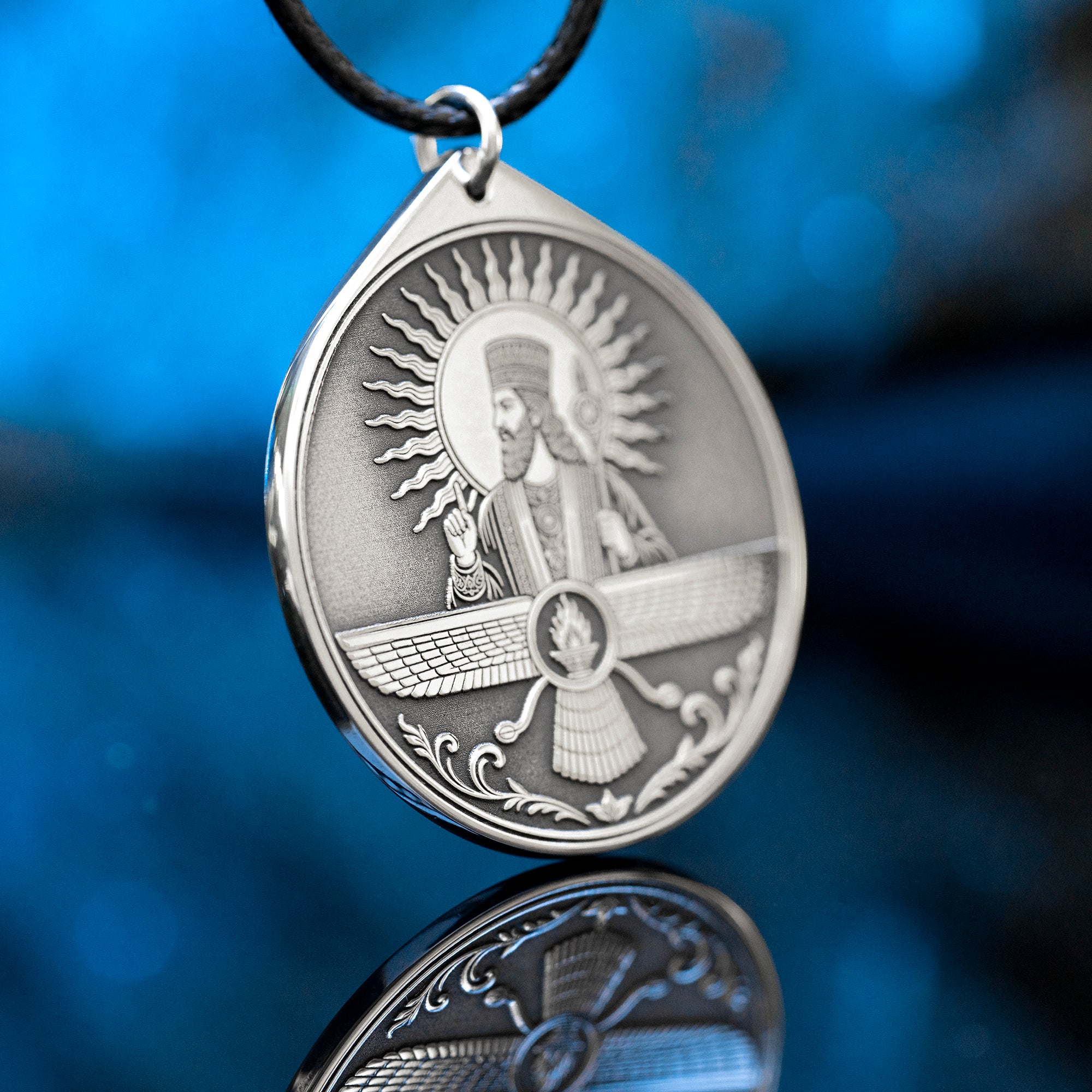 Ahura Mazda pendant with Faravahar style wings, sacred fire and ancient Persian Zoroastrian symbolism