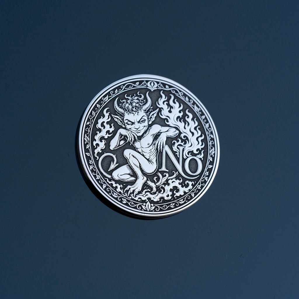 Double-sided fantasy decision coin with a nymph on the Yes side and an imp on the No side