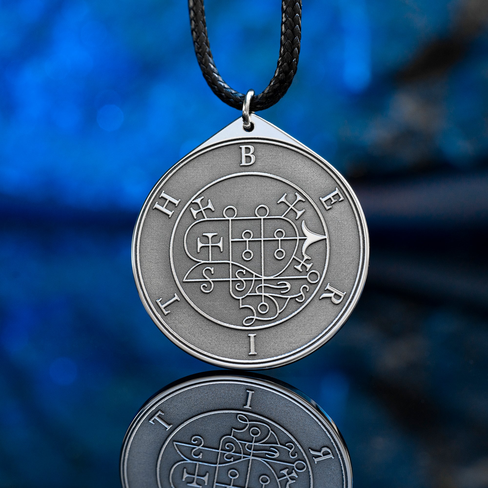 Berith seal pendant with engraved Ars Goetia sigil associated with alchemy, gold, dignities, and true answers