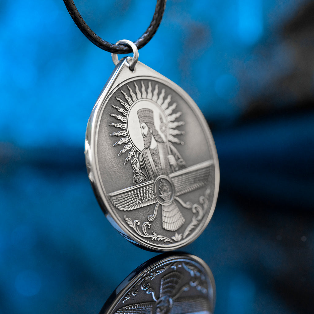 Ahura Mazda pendant with Faravahar style wings, sacred fire and ancient Persian Zoroastrian symbolism