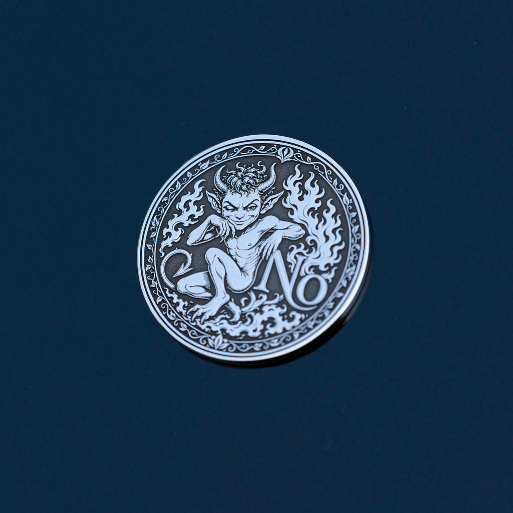 Double-sided fantasy decision coin with a nymph on the Yes side and an imp on the No side