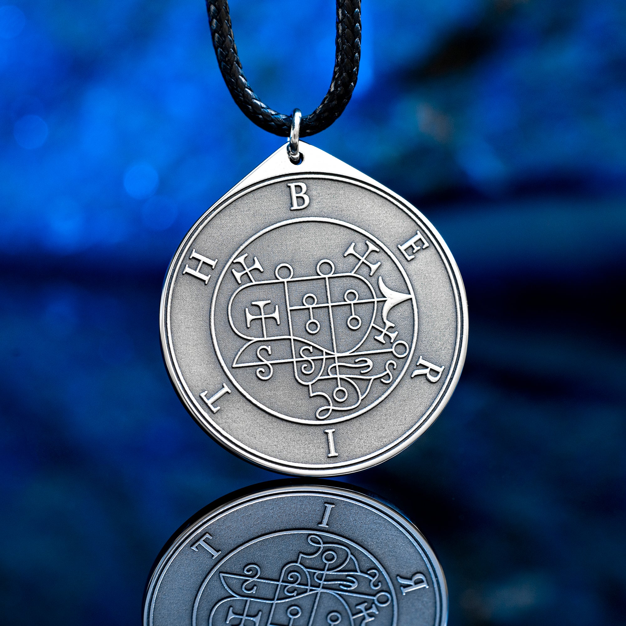 Berith seal pendant with engraved Ars Goetia sigil associated with alchemy, gold, dignities, and true answers