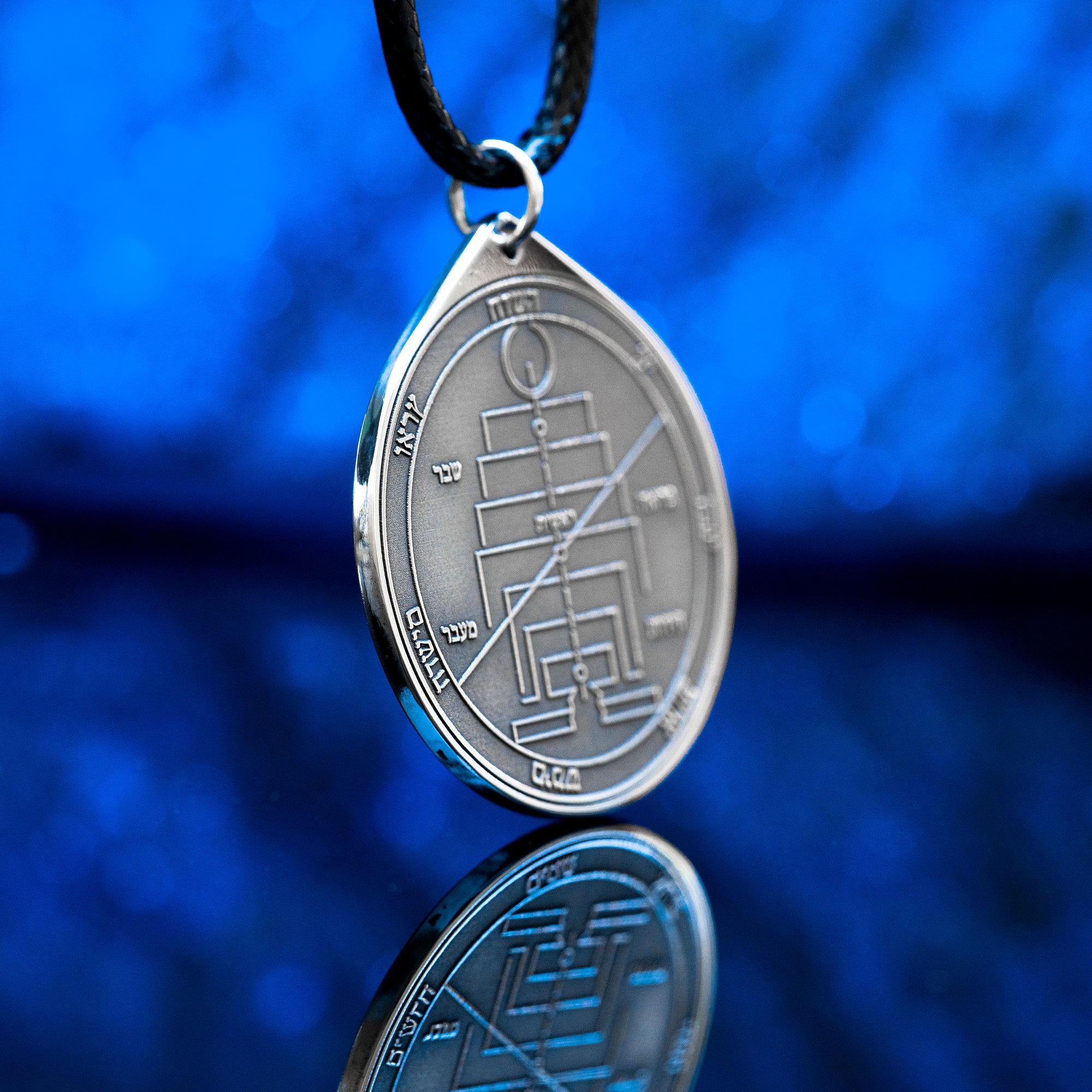 Engraved Fifth Pentacle of Uranus pendant, a planetary talisman for new beginnings, reinvention, freedom, renewal, and creating a new future after profound change
