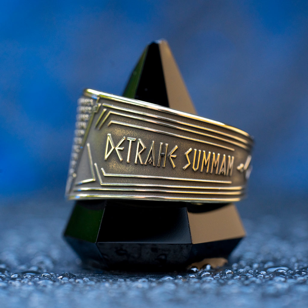 Abracadabra ring with diminishing triangle inscription, Latin spell phrases, ancient healing charm, and protection symbolism