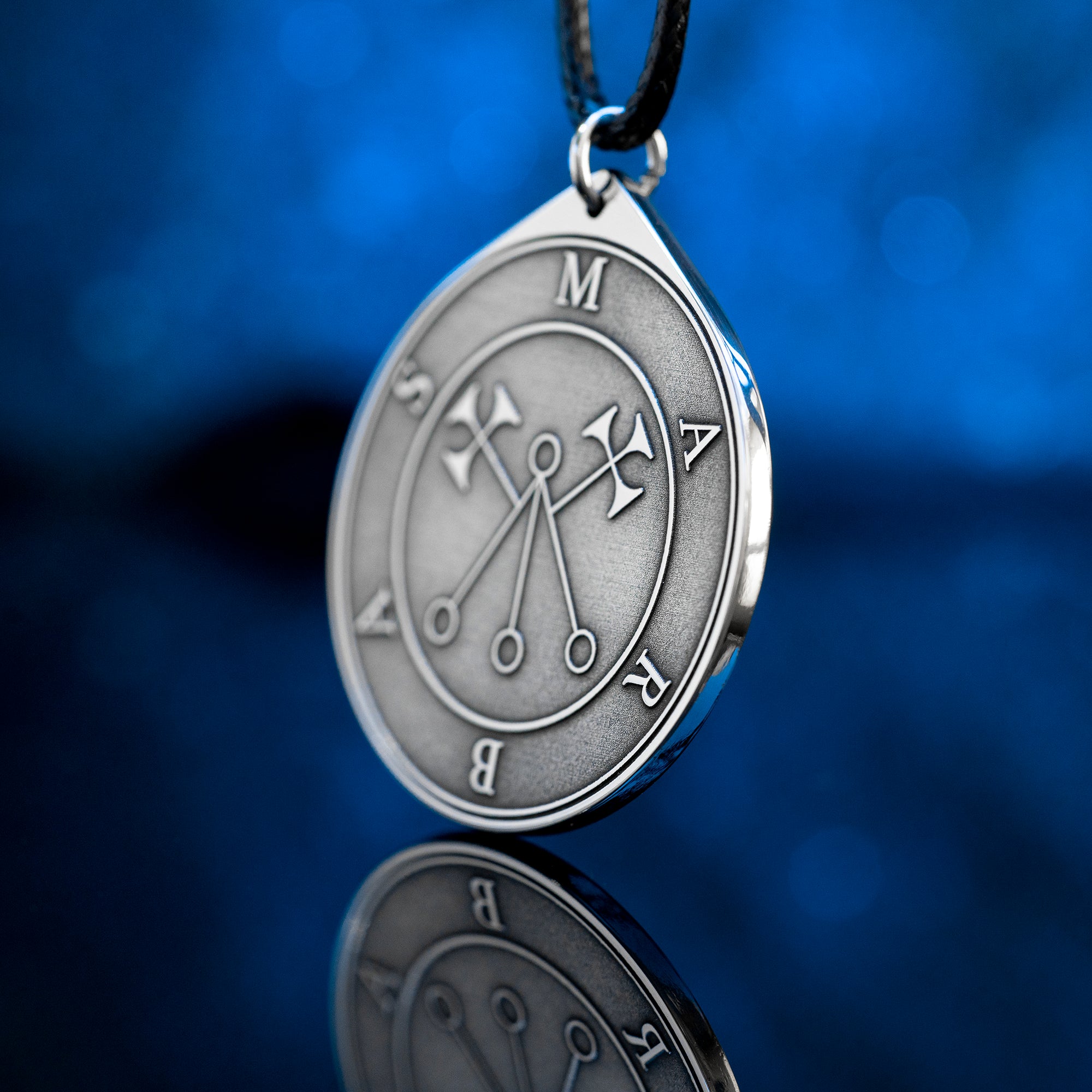 Marbas seal pendant with engraved Ars Goetia sigil associated with healing symbolism, secrets, and mechanical arts.
