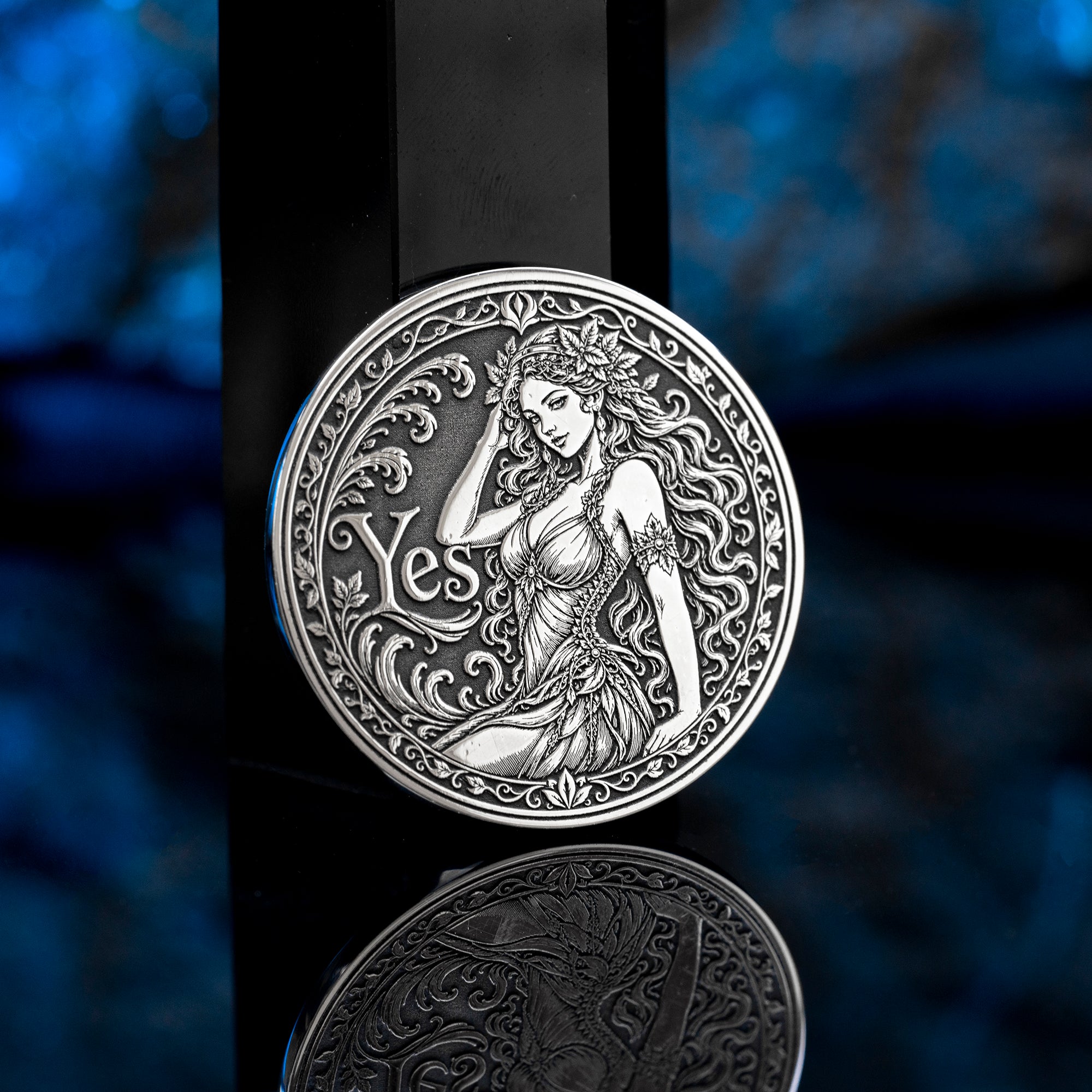 Double-sided fantasy decision coin with a nymph on the Yes side and an imp on the No side