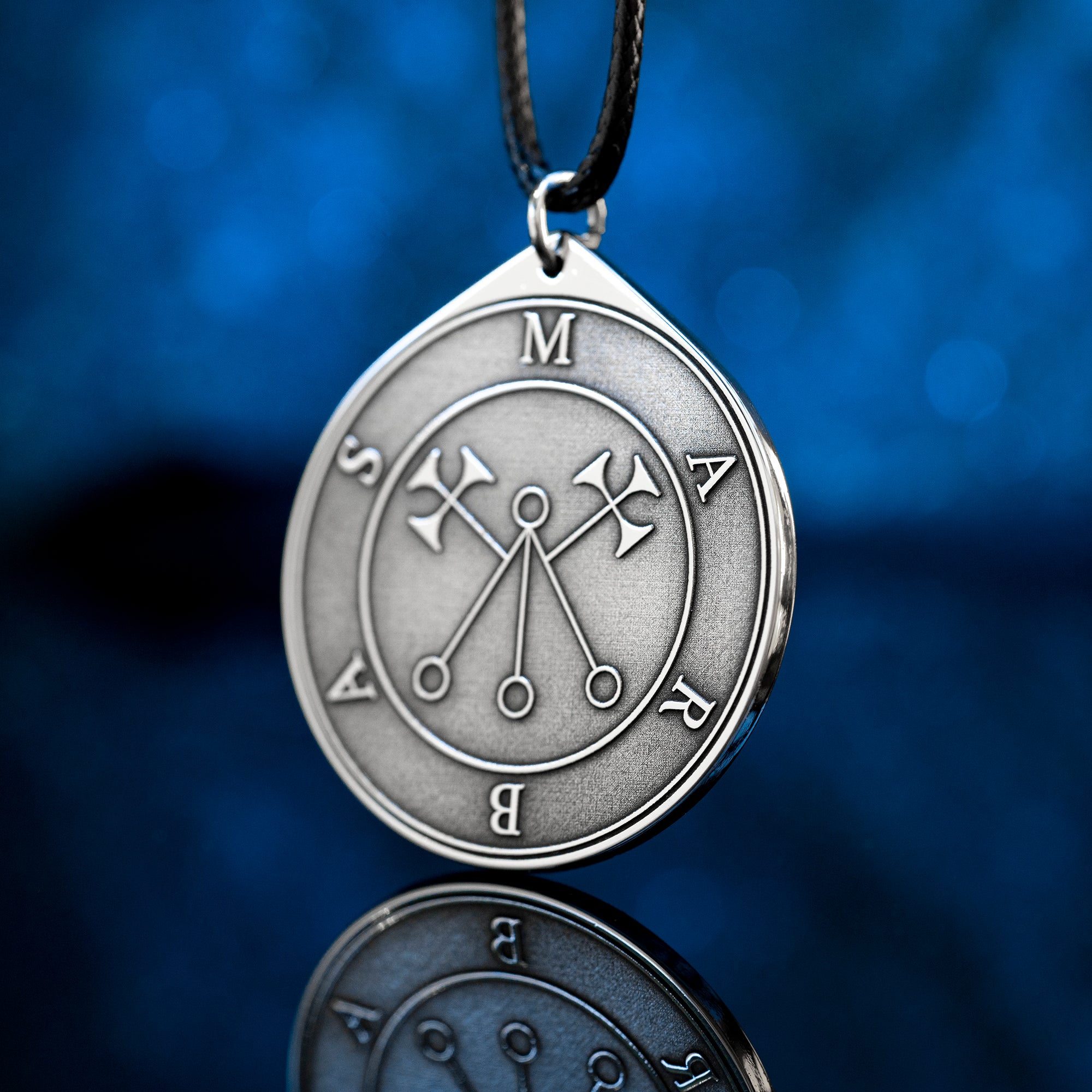 Marbas seal pendant with engraved Ars Goetia sigil associated with healing symbolism, secrets, and mechanical arts.