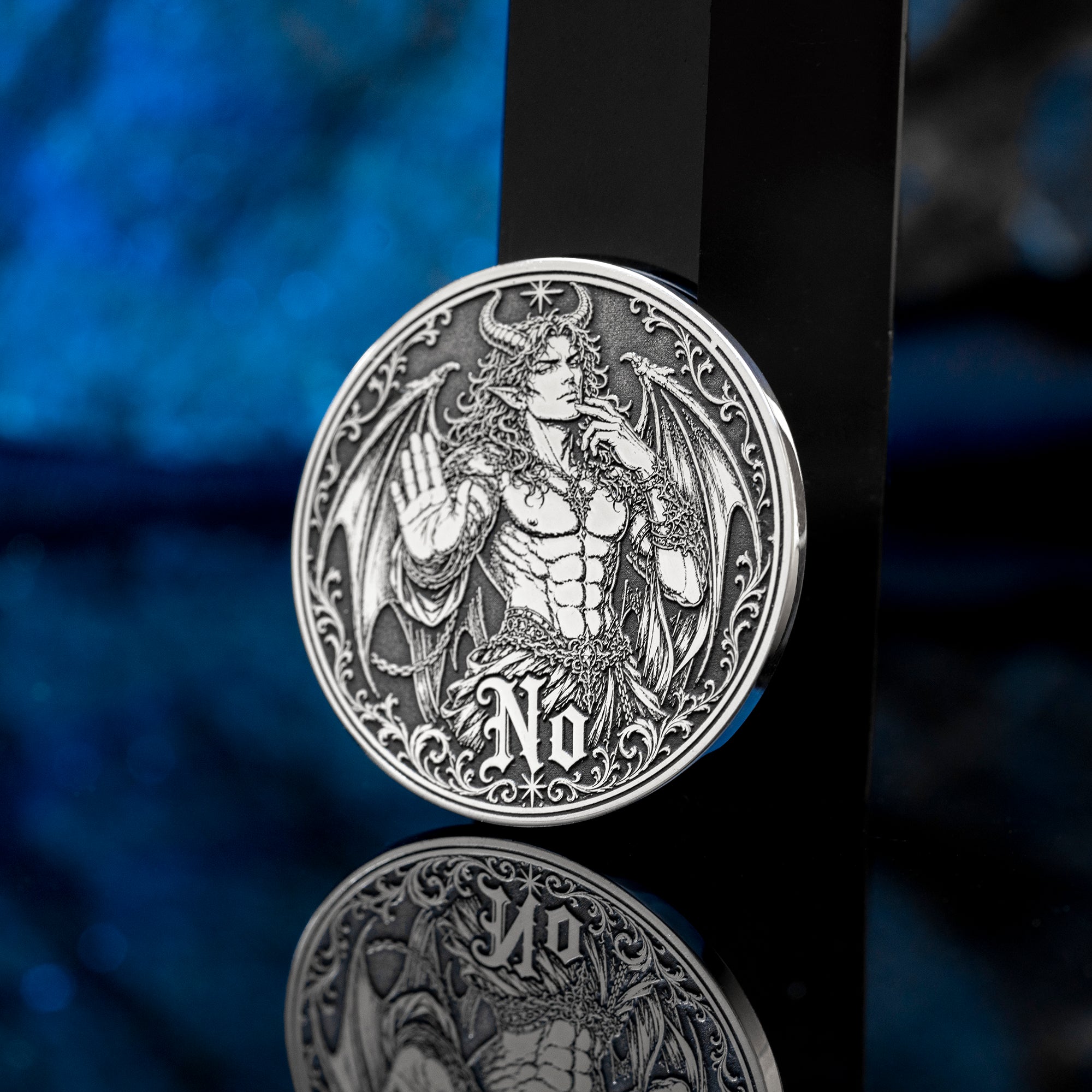 Double-sided angel demon decision coin with Yes and No sides for oracle-style choices