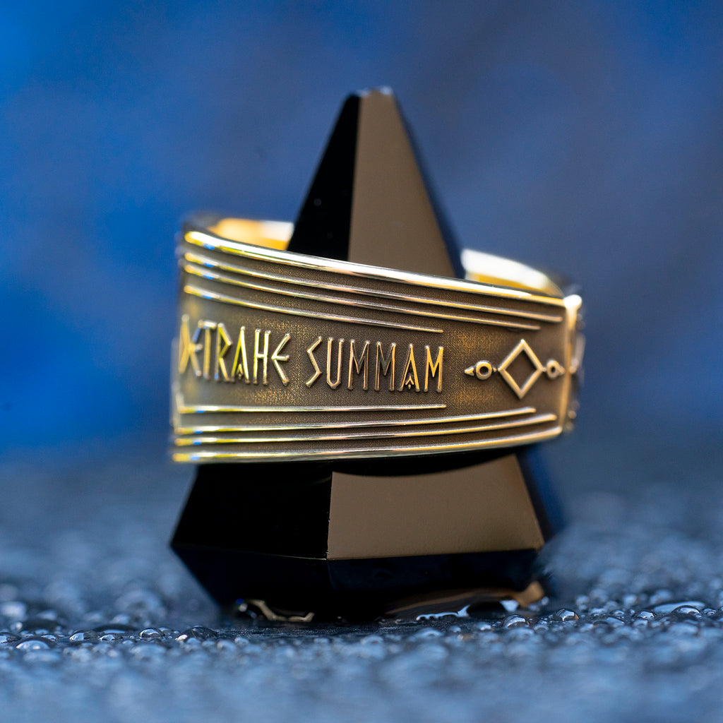 Abracadabra ring with diminishing triangle inscription, Latin spell phrases, ancient healing charm, and protection symbolism