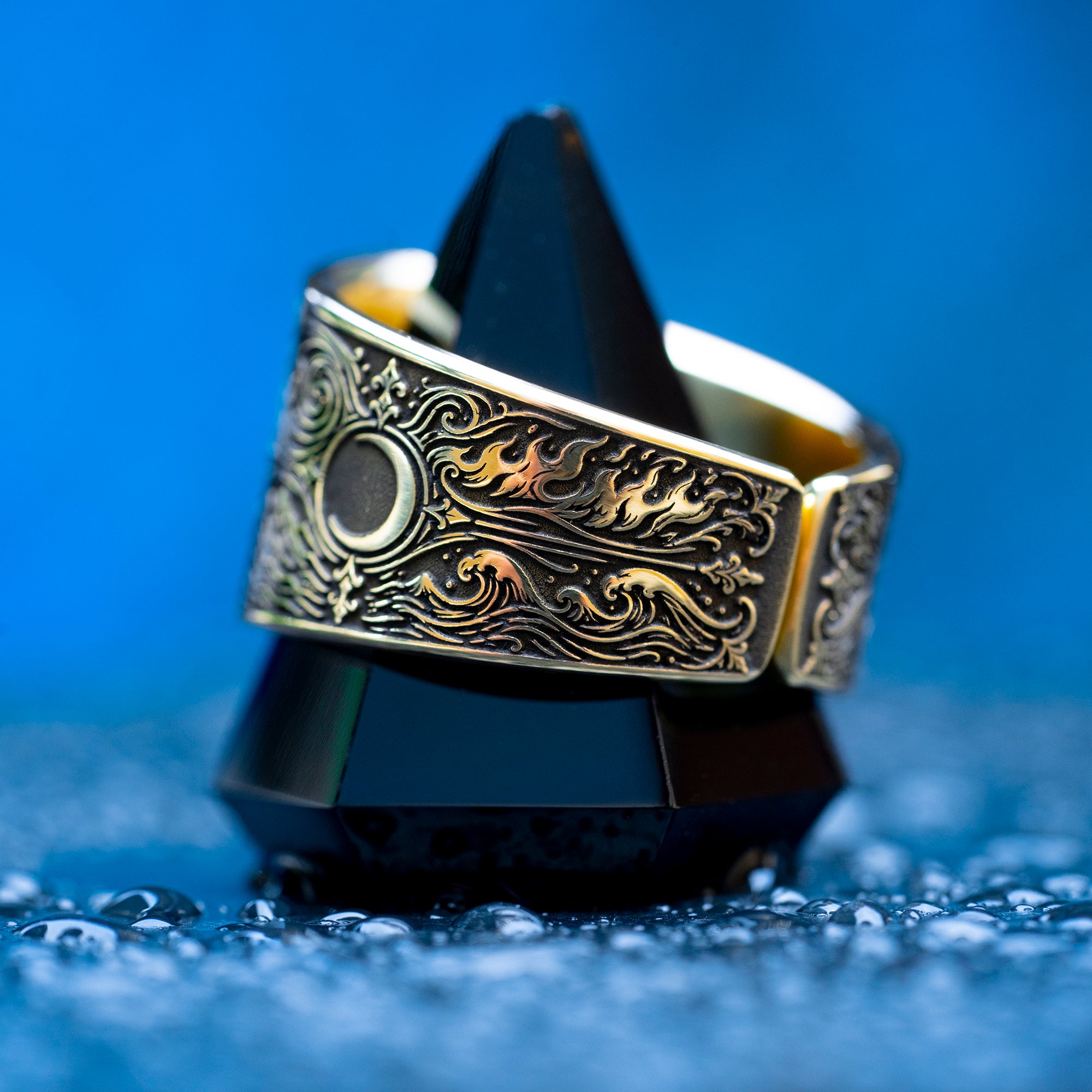 Gothic alchemical ring with Fire, Water, Air, Earth, seven planetary metal symbols, and detailed occult engraving