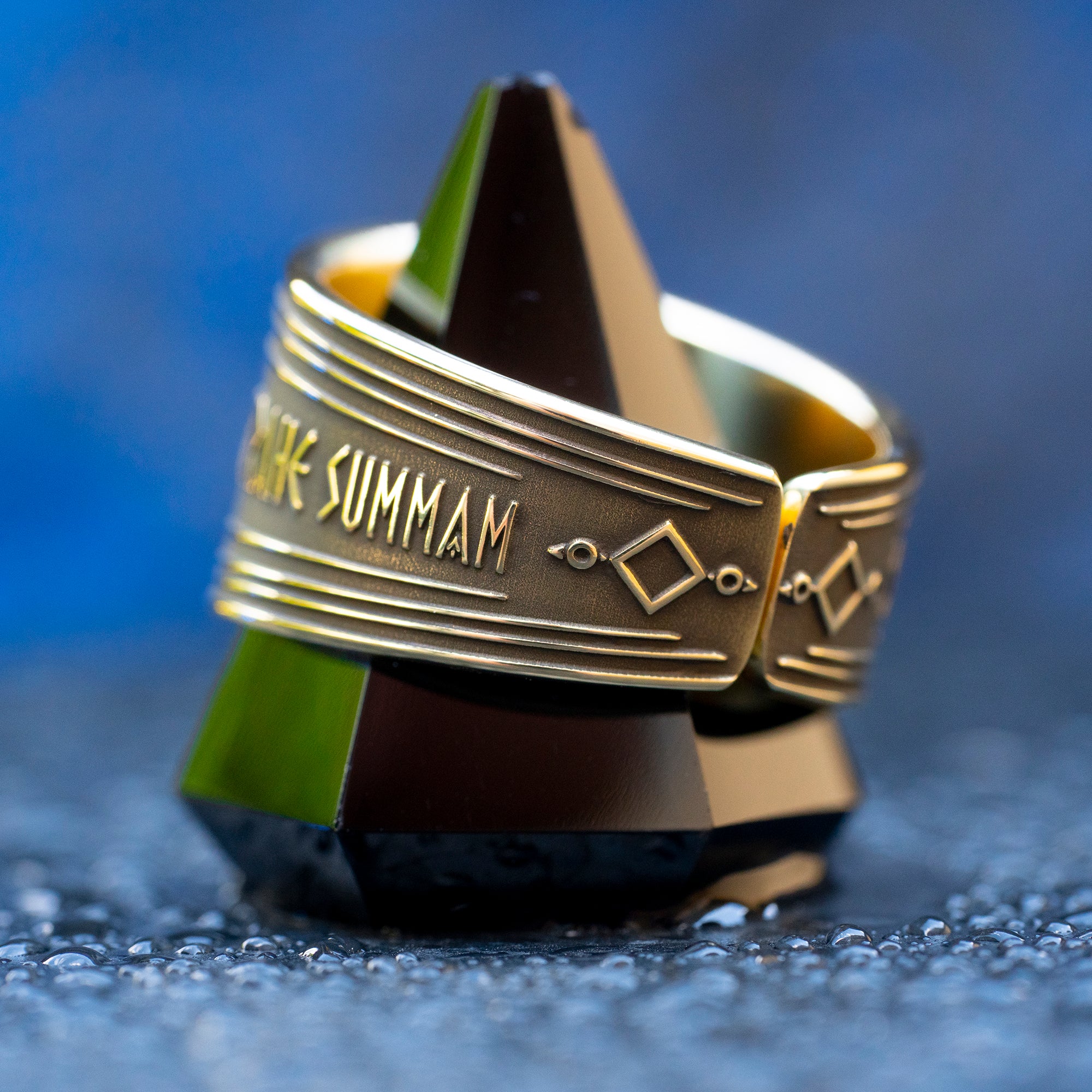 Abracadabra ring with diminishing triangle inscription, Latin spell phrases, ancient healing charm, and protection symbolism