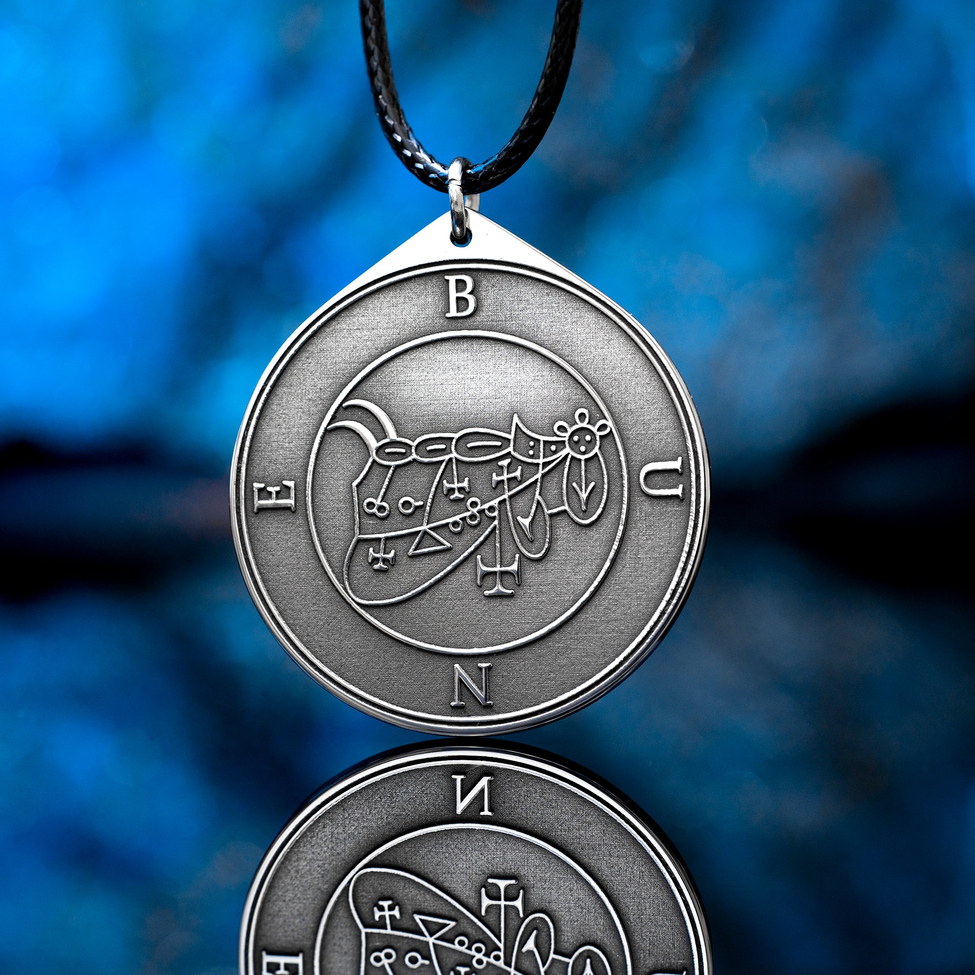 Bune seal pendant with Goetia demon sigil engraved on a dark occult amulet necklace